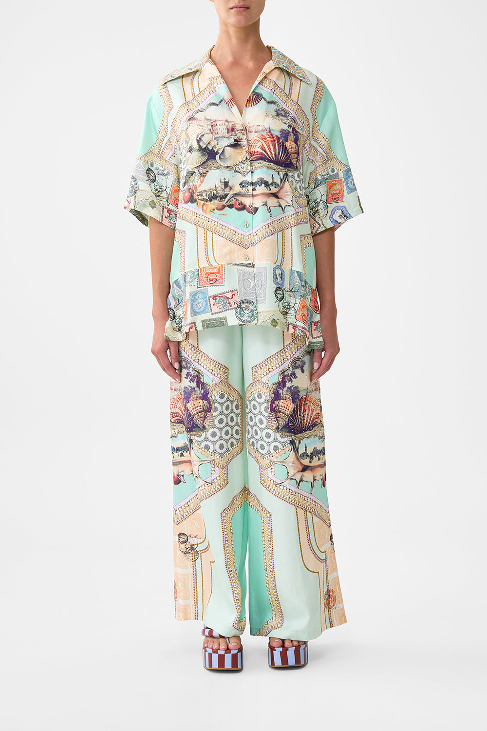 The CAMILLA PLUNGE NECK DRAPED SHOULDER DRESS THE IMPERIAL GATE in our  print.
