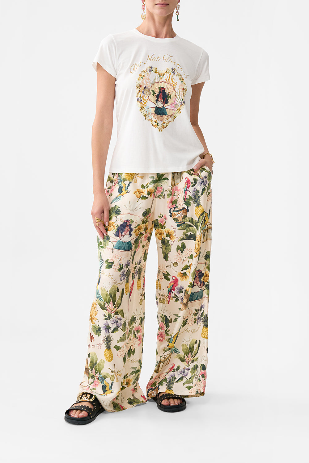 The CAMILLA BUTTON FRONT HALTER PLAYSUIT JUST COASTING in our  print.