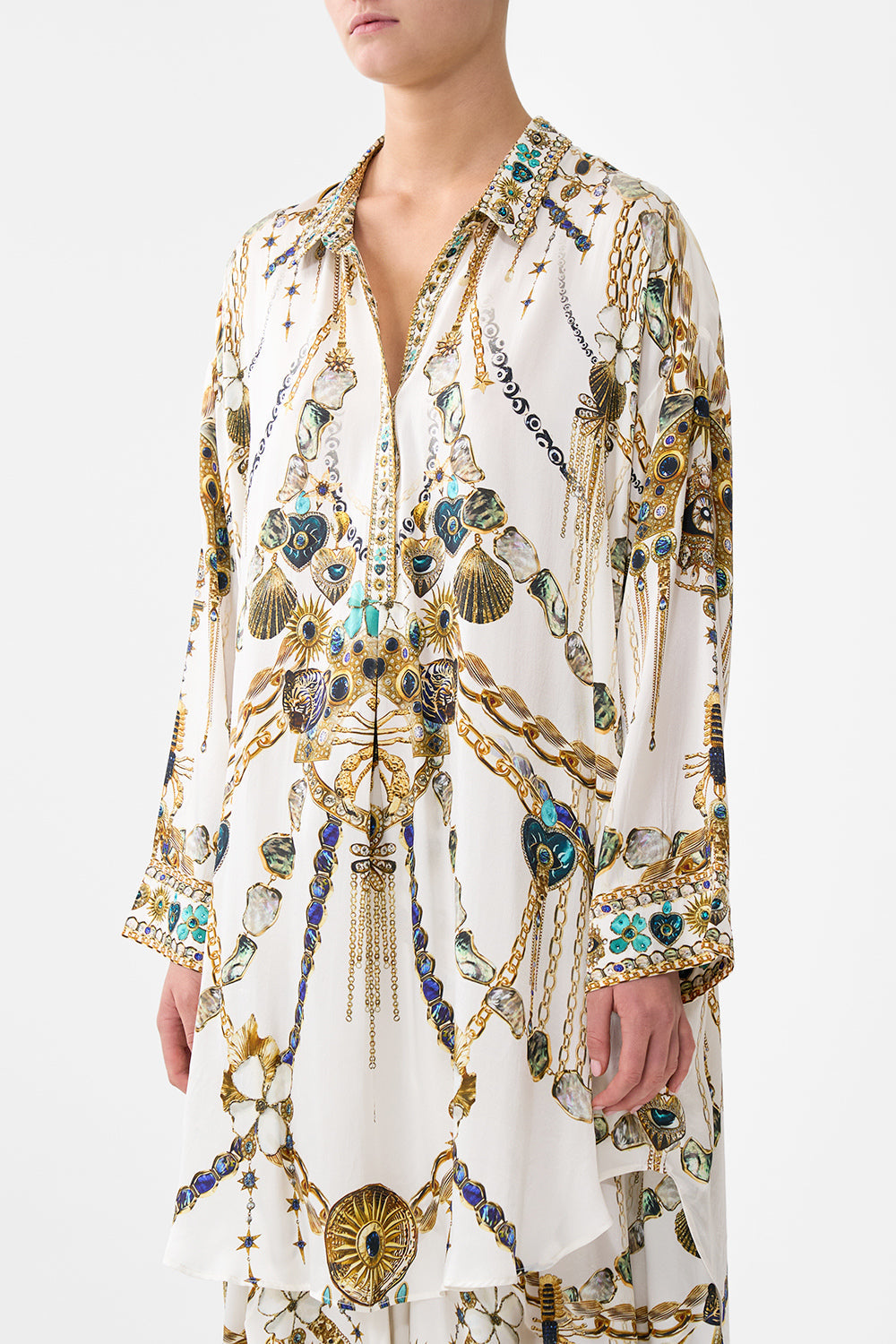 The CAMILLA SHORT SLEEVE OVERSIZED SHIRT PAPERS AND CURIOUS CAPERS in our  print.